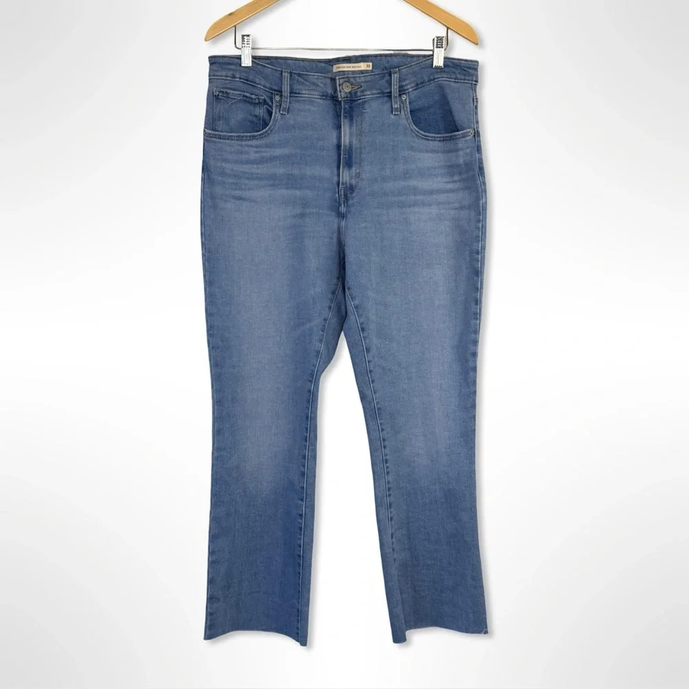 Levi’s 725 High Rise Bootcut Jeans 33 – Cropped Raw Hem Light Wash